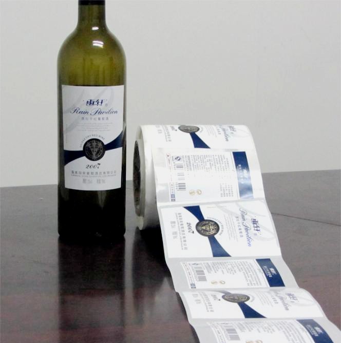 China Customized Design Waterproof Red Wine Shrink Sleeve Labels Self Adhesive Bottle Label on sale