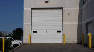 China Electric Overhead 6500mm Polyurethane Fire Rated Sectional Door wholesale