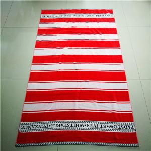 China 100% cotton velour woven jacquard custom logo beach towel stripe beach towel wholesale