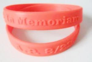 China embossed silicone wristband with logo , cheap embossed silicone bracelet for promotion wholesale