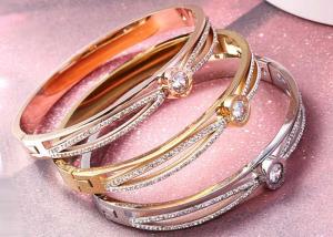 China Bracelet female gift 18K gold letter Naan zircon jewelry stainless steel cross gold bracelet wholesale on sale
