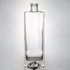 China Super Flint Glass Custom Mountain Base 750ml Whisky Rum Glass Liquor Bottle for Vodka Gin wholesale