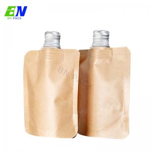 China Waterproof Kraft Paper Stand Up Pouch With Spout Packaging Spout Pouch For Liquid Packaging on sale