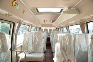 China 7.7 Meter 31 Passenger Luxury Tour Coaster Minibus Coach Low Gross Weight wholesale